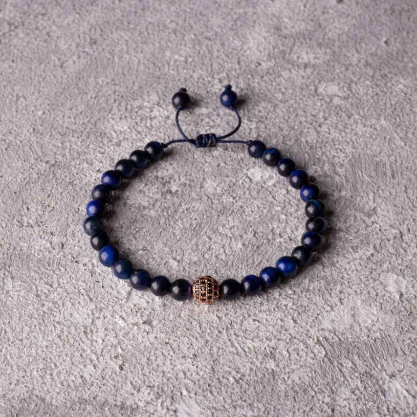 Blue tiger eye with rose zircon ball