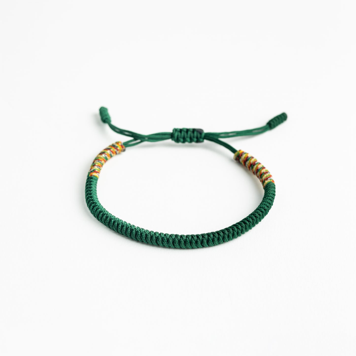 Emerald Symphony: Green Tibetan Bracelet with Multicolor Thread Accents