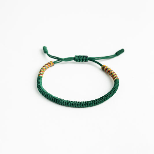 Emerald Symphony: Green Tibetan Bracelet with Multicolor Thread Accents