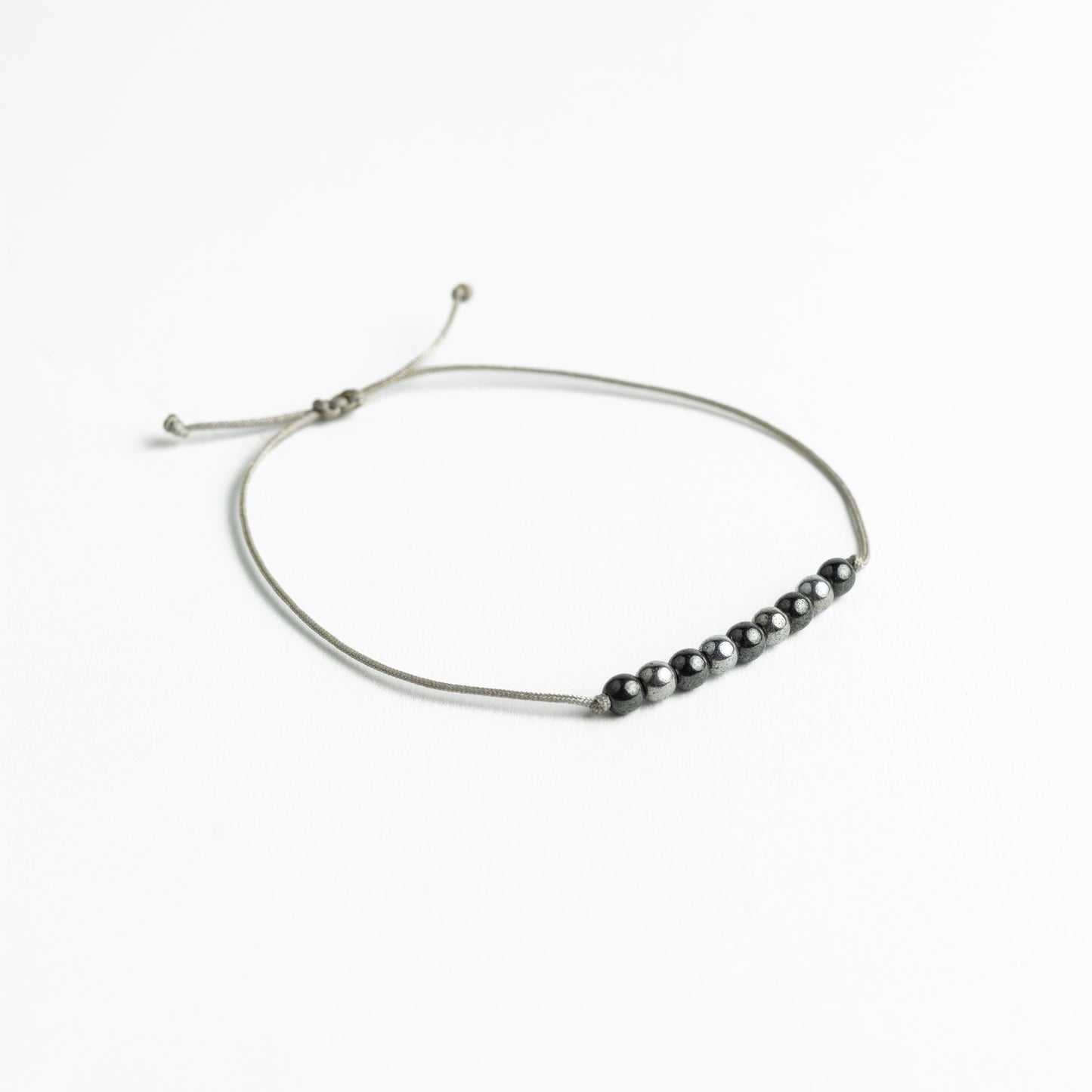 Nine-Stone Parcora Hematite Bracelet