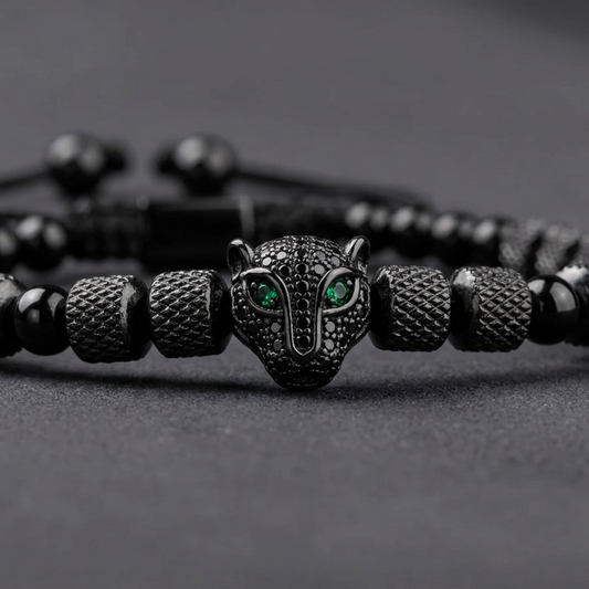 Black Tiger Zircon Stainless Bracelet, close-up of green-eyed tiger head and textured beads.